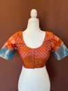 Orange and blue silk blouse