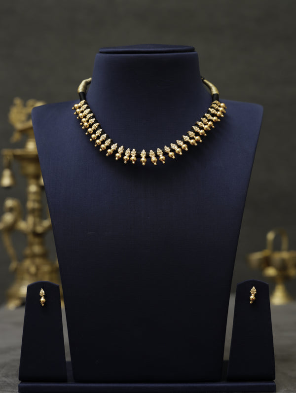 Antique gold beads black thread